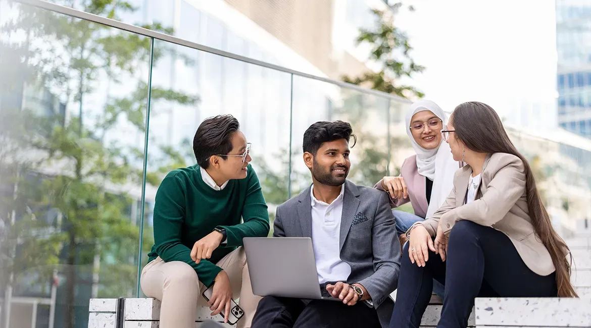 Illustrative photo of business professionals talking outdoors in Singapore