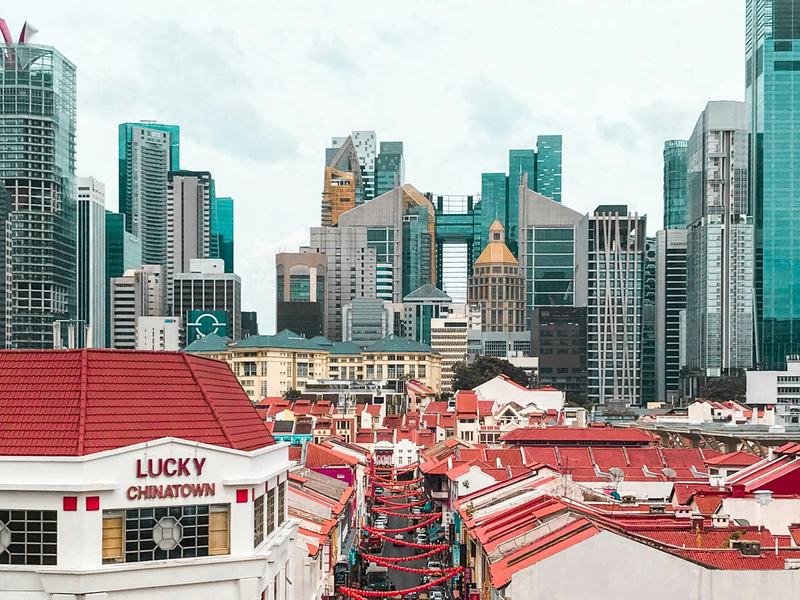 Chinatown rooftops with city towers behind